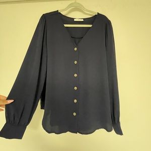 Black button down blouse.